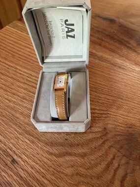 Vintage Women's Gold-Tone Rectangular Watch with Tan Leather Strap